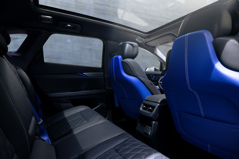 Back Seat View of the 2026 OPTIQ-V Blue Front Seats, Sun Roof, and Interior | Bob Johnson Cadillac in ROCHESTER NY